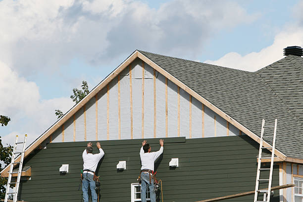 Professional Siding Contractor technician working in Covington, VA